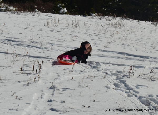 Claire sledding